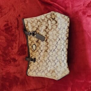 Brown and tan coach purse